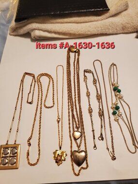 7 Gold Chain Necklaces, items # A 1630- 1636. wt, 125 grams.